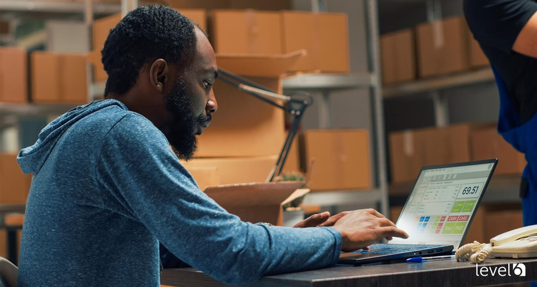 A Man Using a Business Software