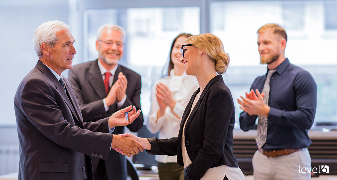 Sales Team Member Being Recognized