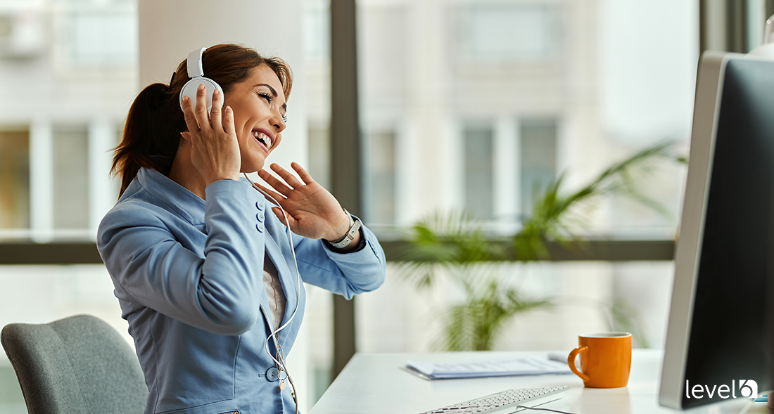 An Employee Receiving High-End Headphones