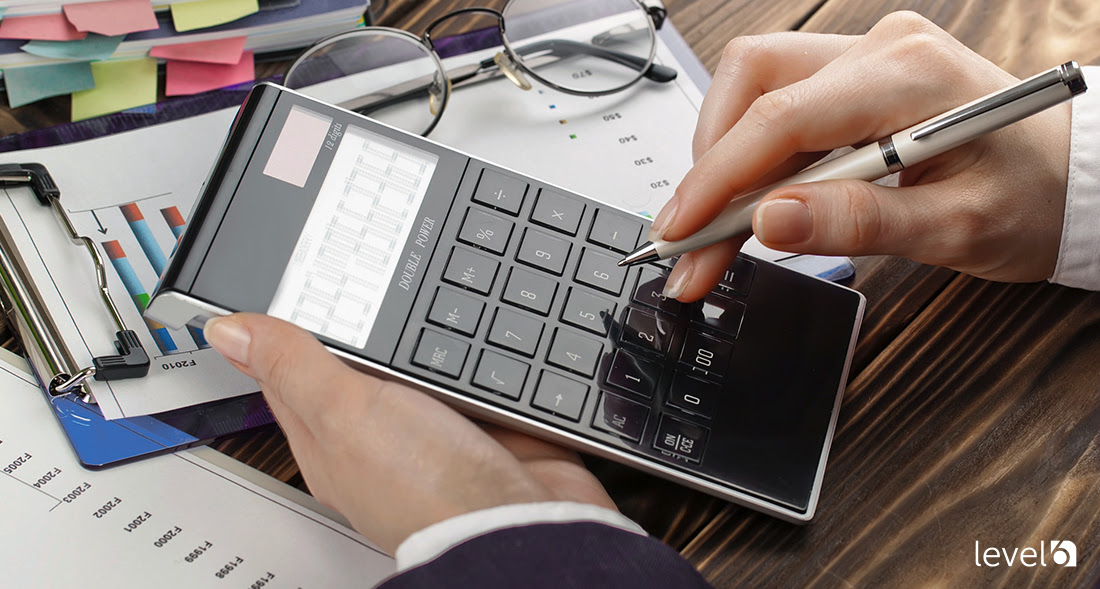 A Person Using a Calculator