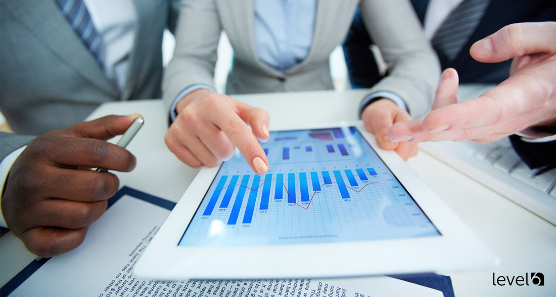 A Team Reviewing a Sales Chart