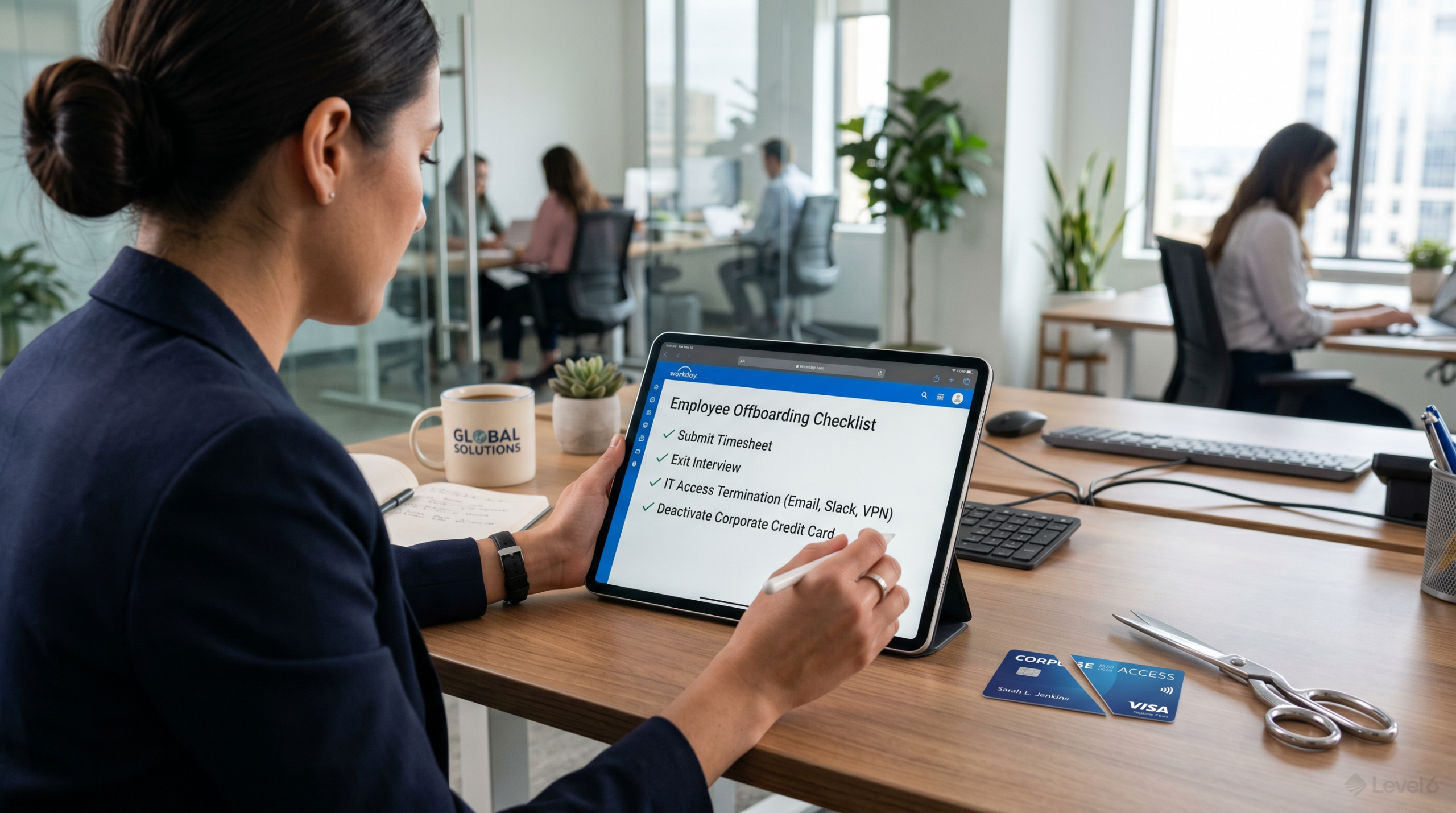 HR manager completing employee offboarding checklist with corporate card deactivation step